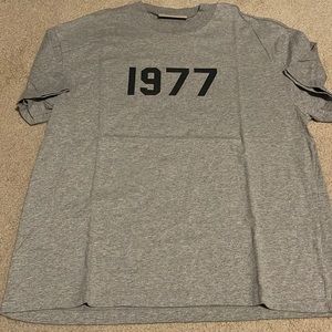 Fear Of God Essentials short sleeve 1977 tshirt. Heather Grey. Size M.